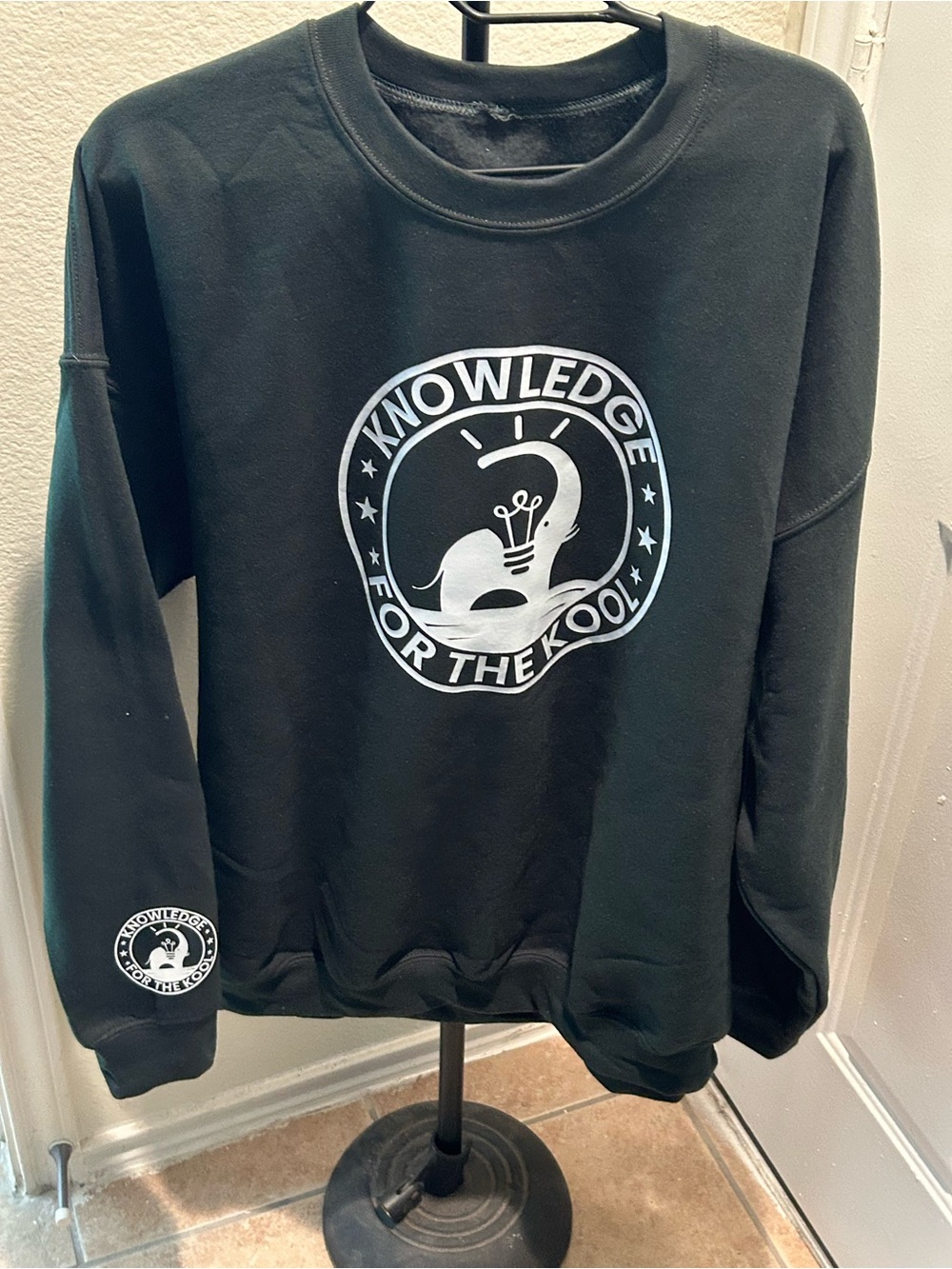 Dark Green Crewneck Sweatshirt with White 'Knowledge For The Kool' Logo